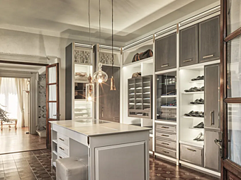 Custom oak walk-in wardrobe with integrated lighting Martini Interiors Essenza Custom oak walk-in wardrobe with integrated lighting Martini Interiors Essenza factory MARTINI INTERIORS from Italy