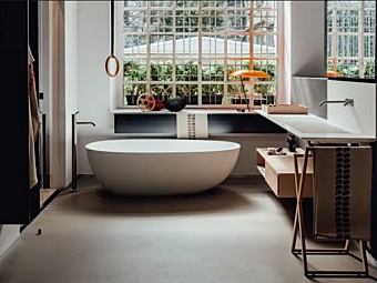 Freestanding oval bathtub made of Cristalplant AGAPE Spoon M factory Agape from Italy